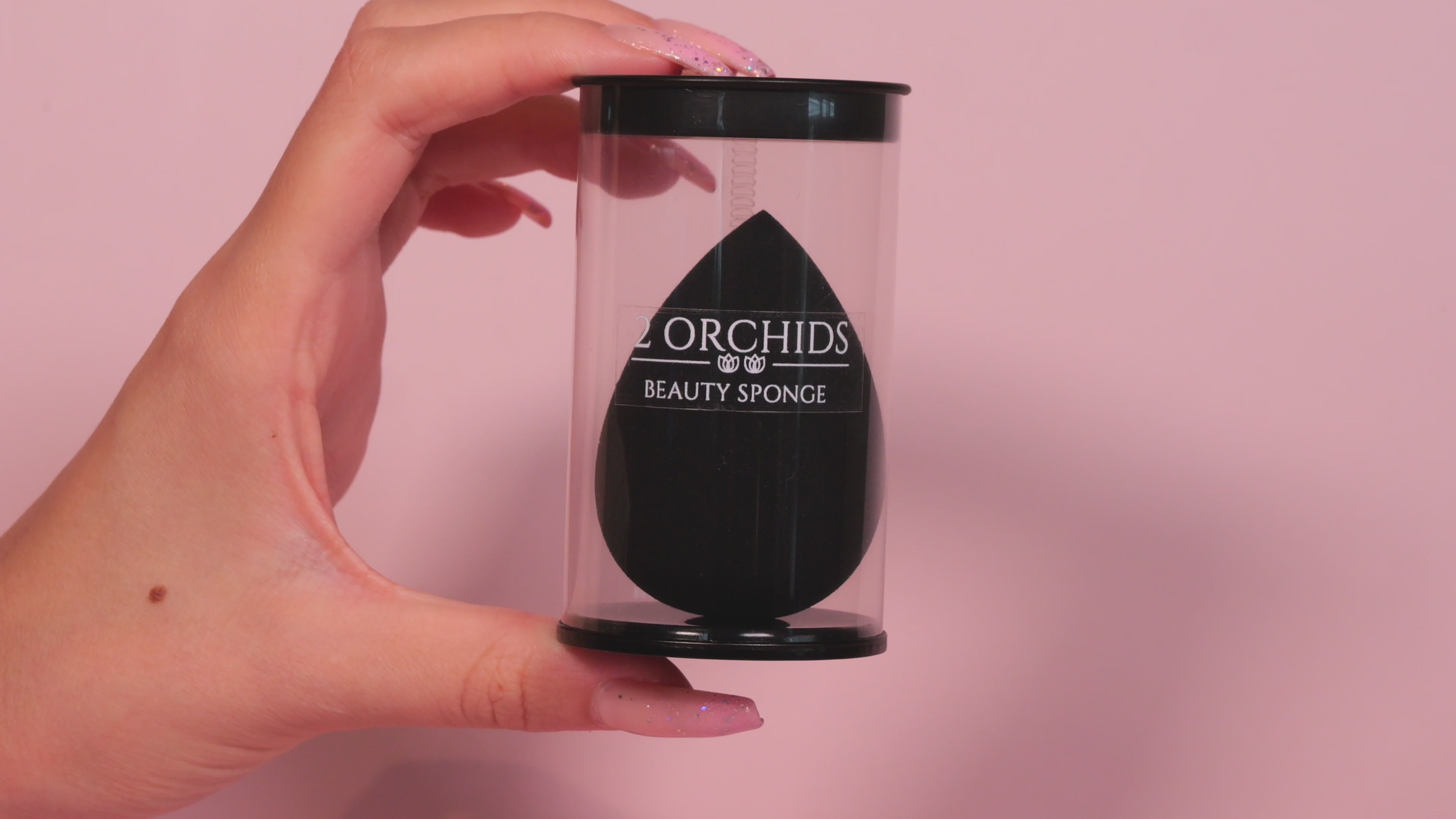 Load video: Black Beauty Blender for makeup blending